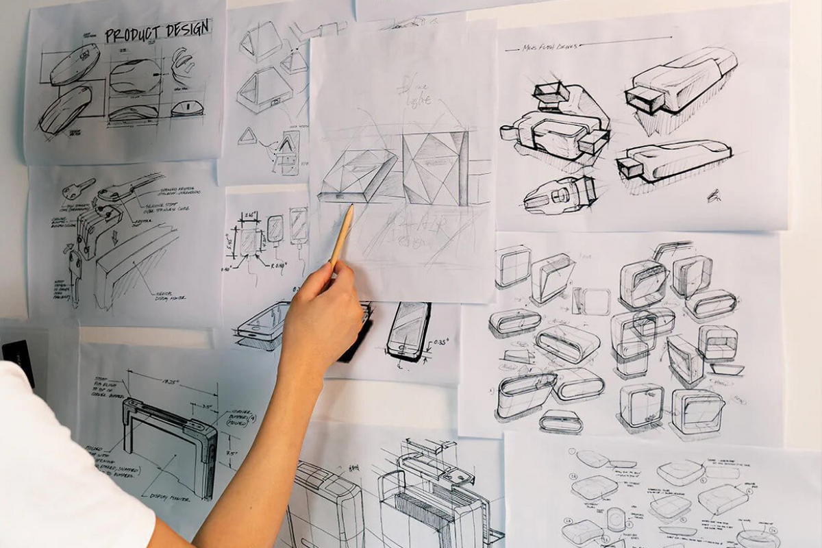 Ottocast product design sketches showing wireless CarPlay and Android Auto adapter innovation process