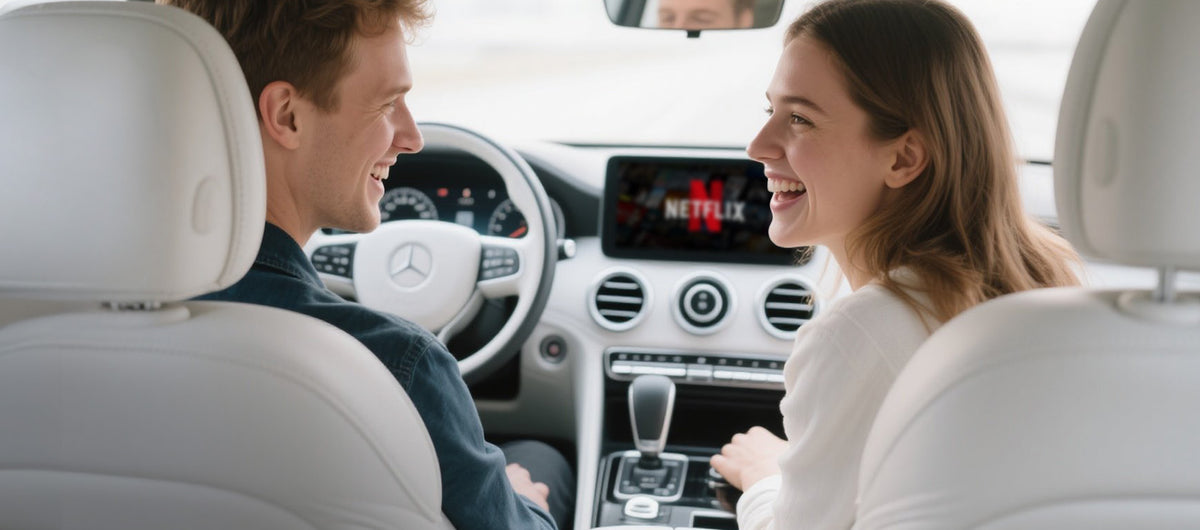 Couple enjoying Netflix streaming in Mercedes car with Ottocast wireless adapter for in-car entertainment
